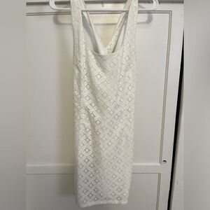 White lace sundress with cross strapped back. Size XS